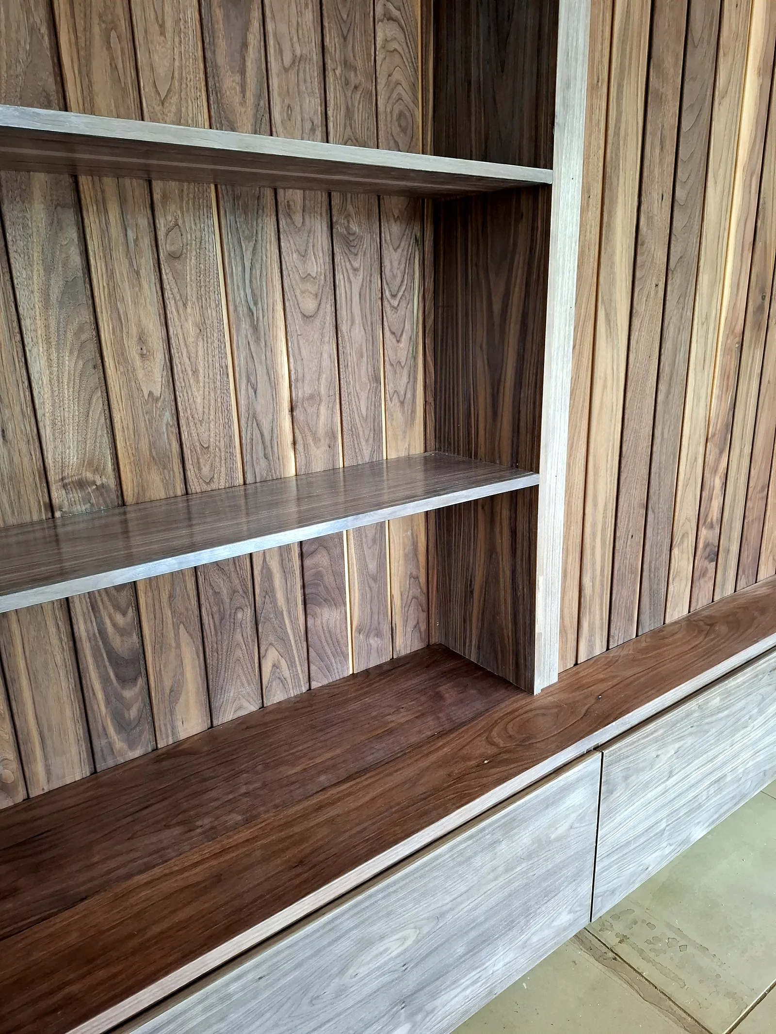 Walnut shelf and panelling detail