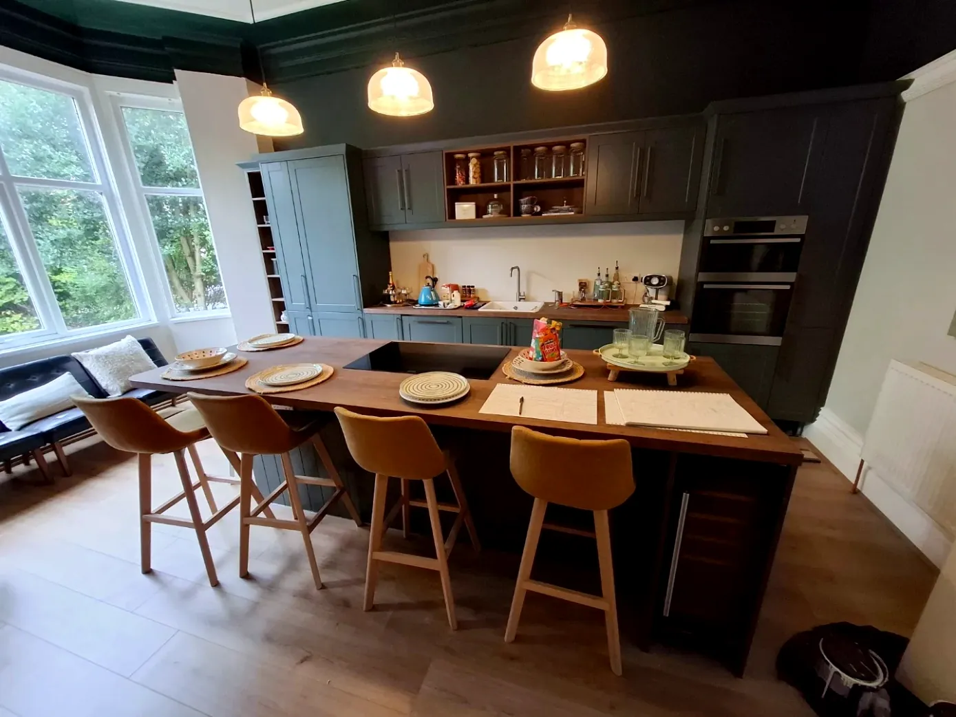 Shaker kitchen with a large island and breakfast bar, fitted in Wallasey